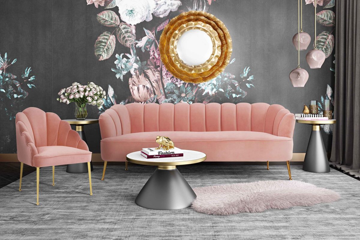 A pink couch with matching accent chair from TOV Furniture